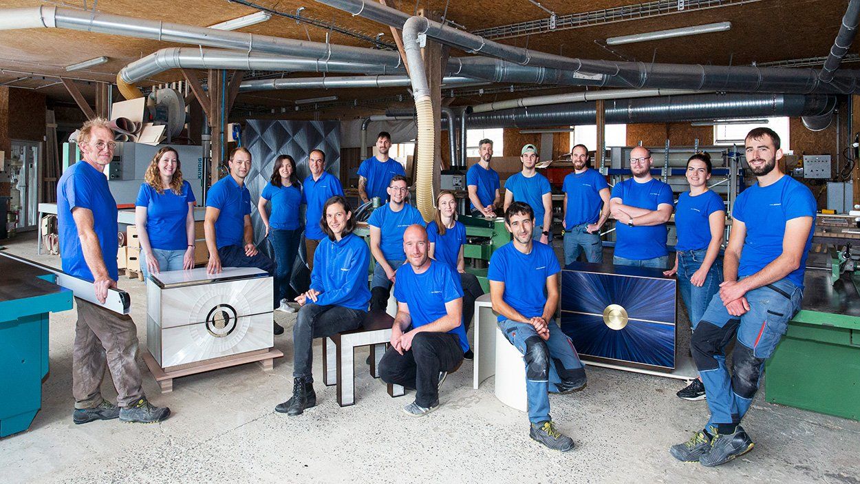 The team of master craftsmen.